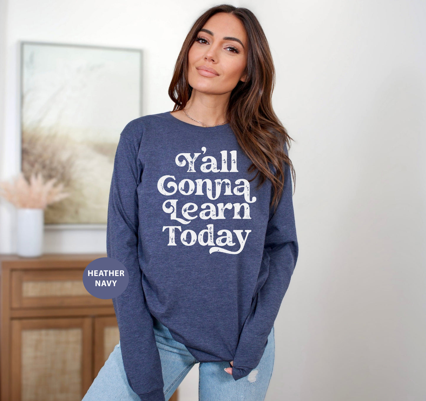 a woman wearing a sweater that says, yall gona learn today