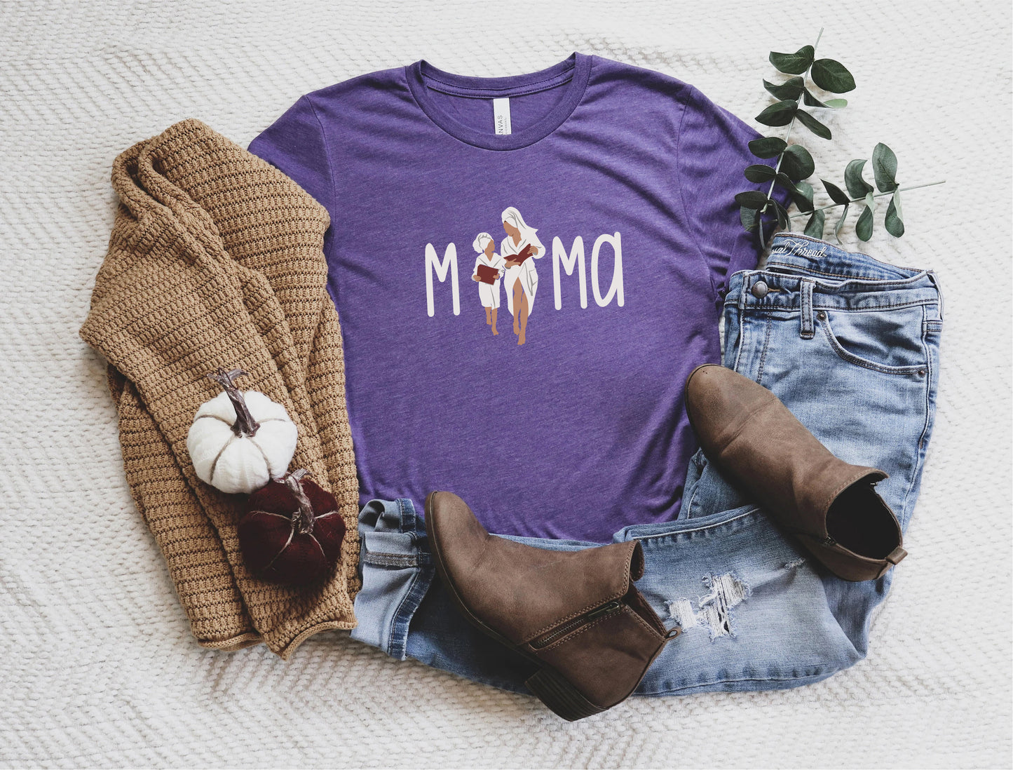 a purple shirt that says mom on it