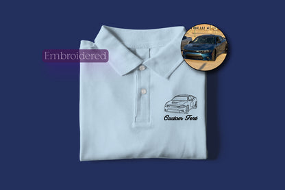 a polo shirt with a picture of a car on it