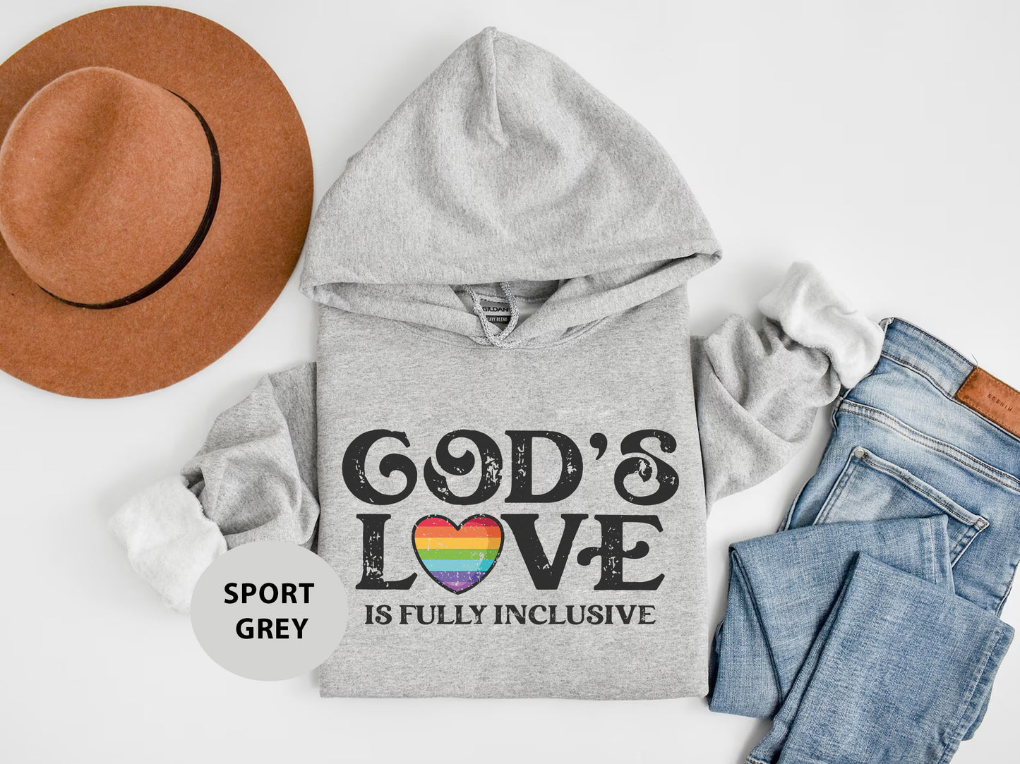 a gray hoodie with a rainbow heart and god's love is fly inc