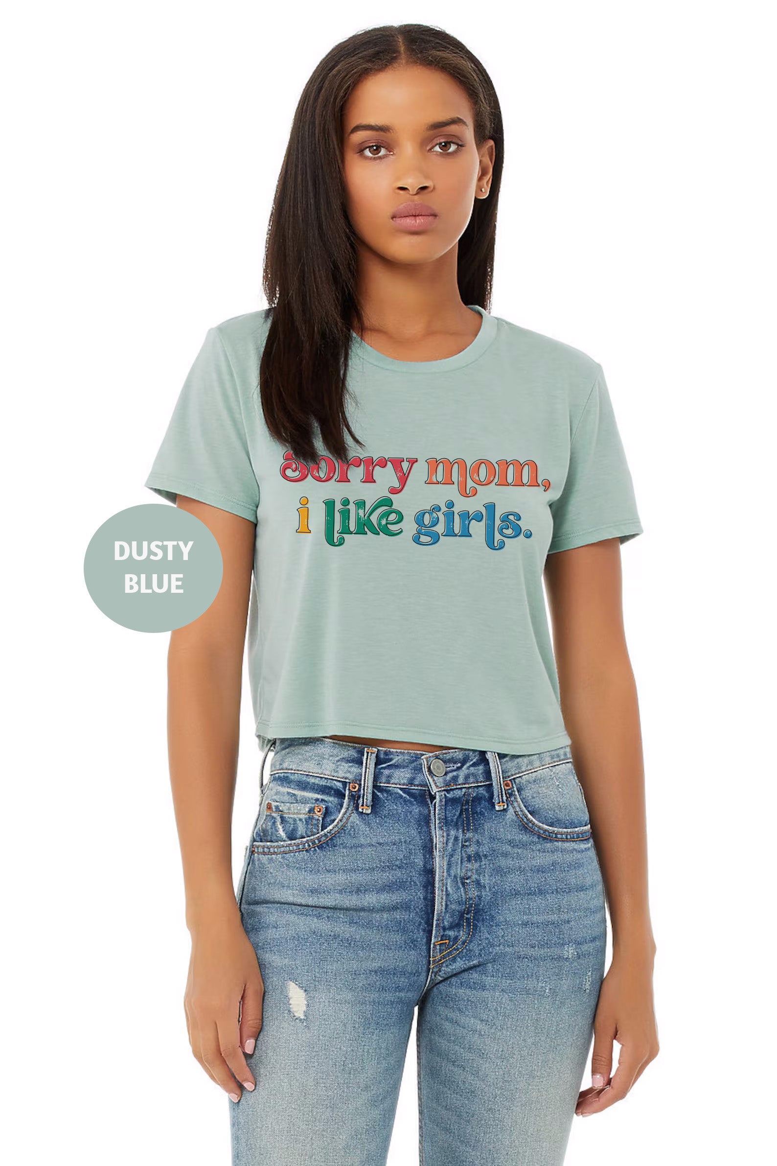 a woman wearing a t - shirt that says sorry mom i like girls