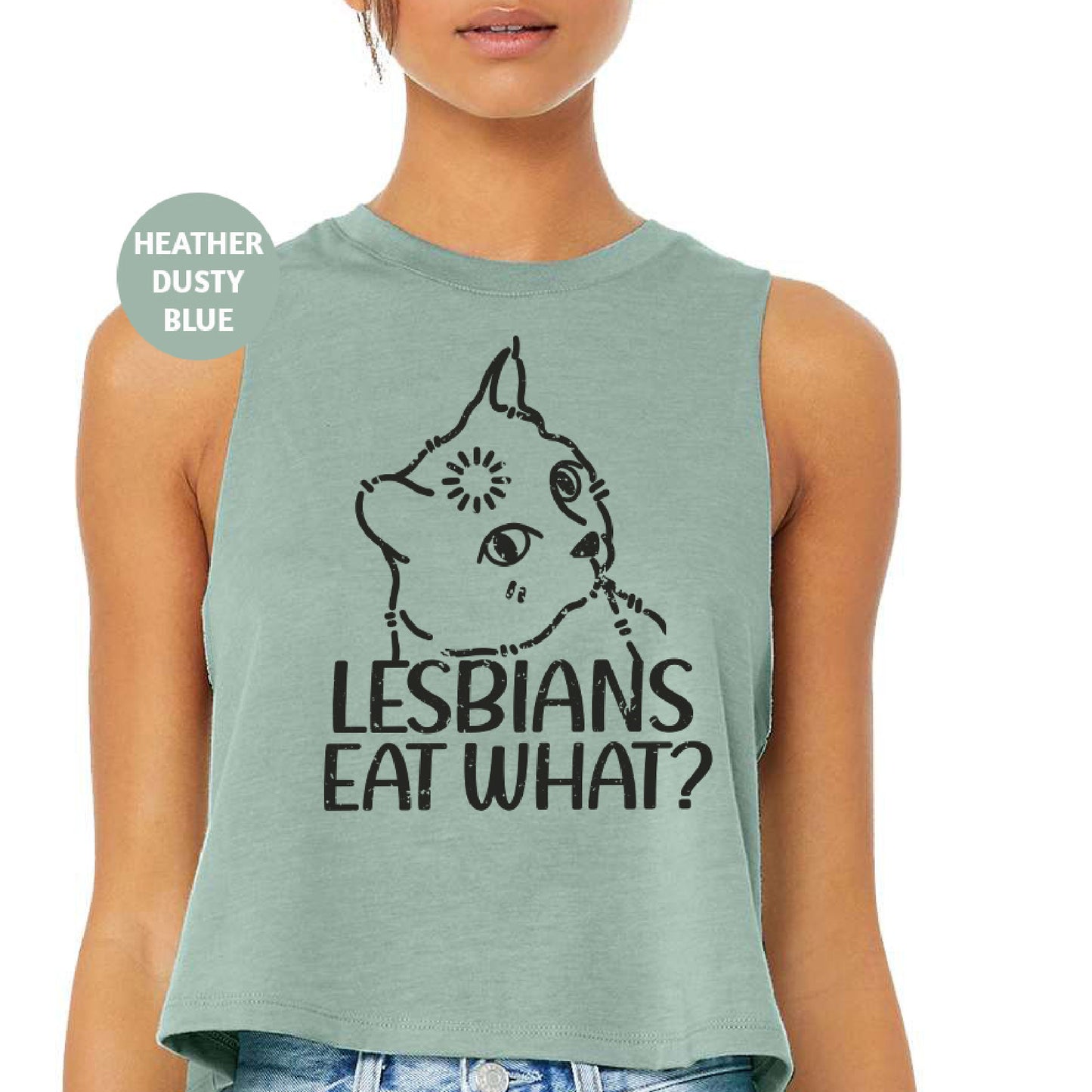 a woman wearing a tank top that says lesbians eat what?