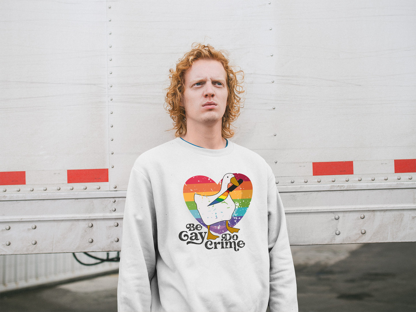 a man standing in front of a white truck