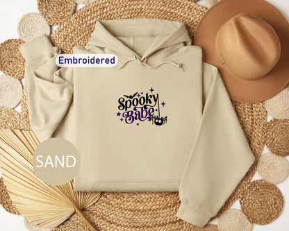 a white hoodie with the words spooky purple on it