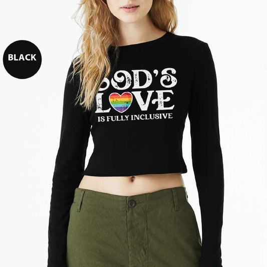 a woman wearing a black crop top with a rainbow heart on it