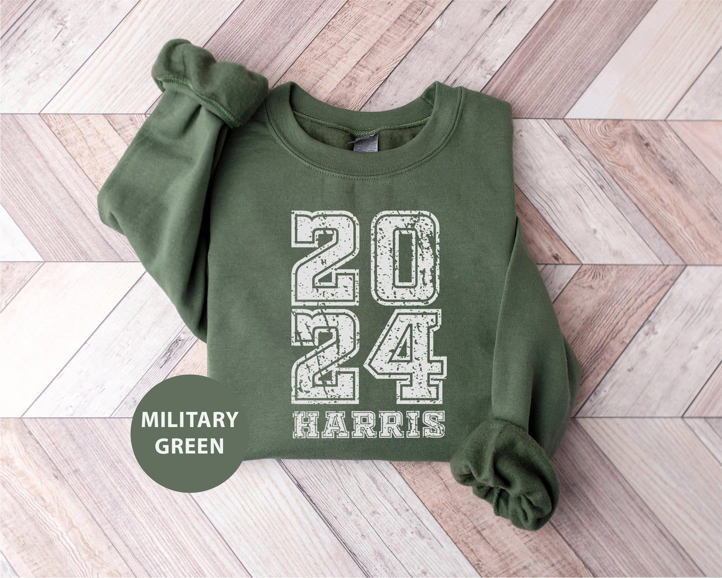 a green sweatshirt with the number twenty four printed on it