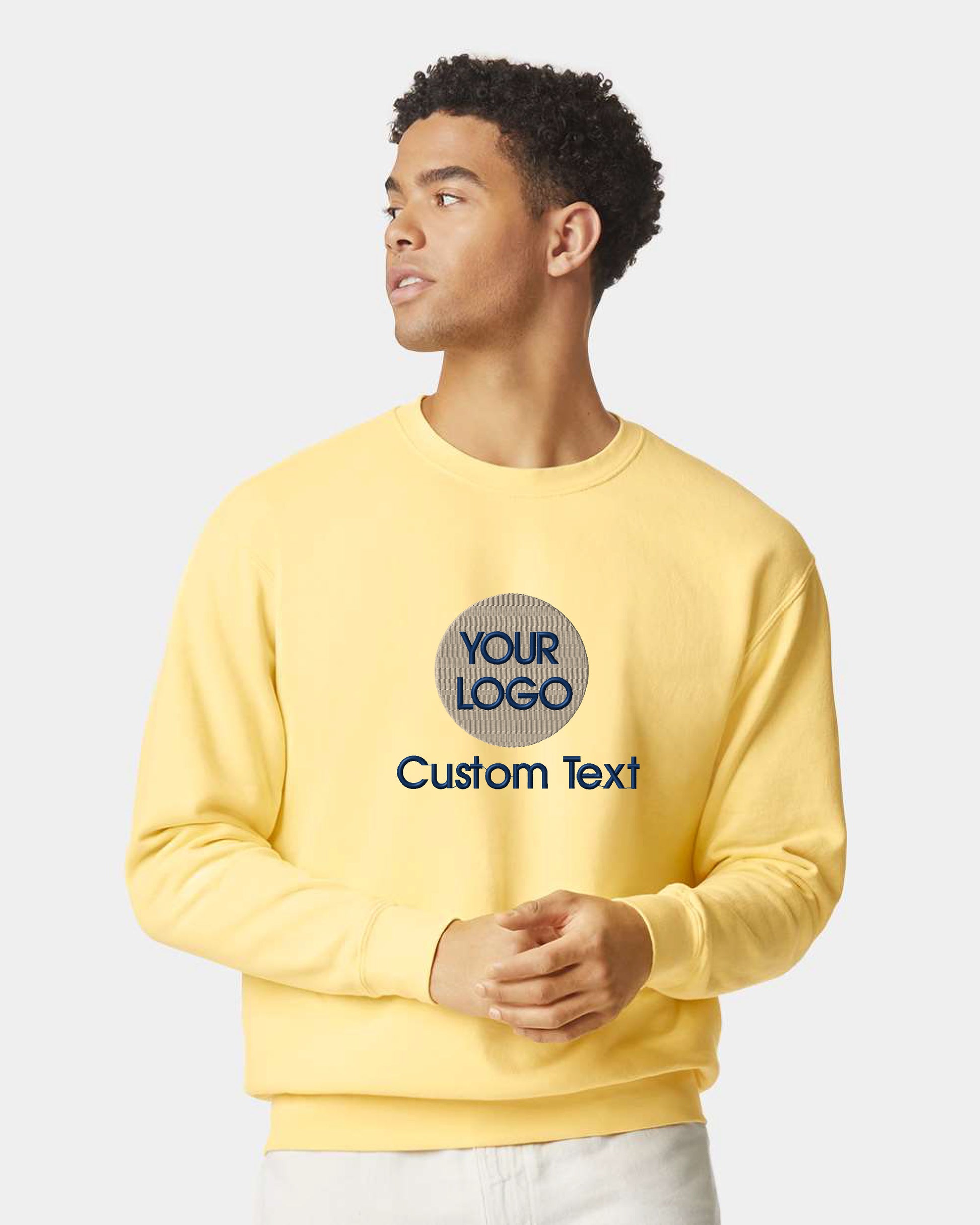 a man wearing a yellow sweatshirt with a custom text on it