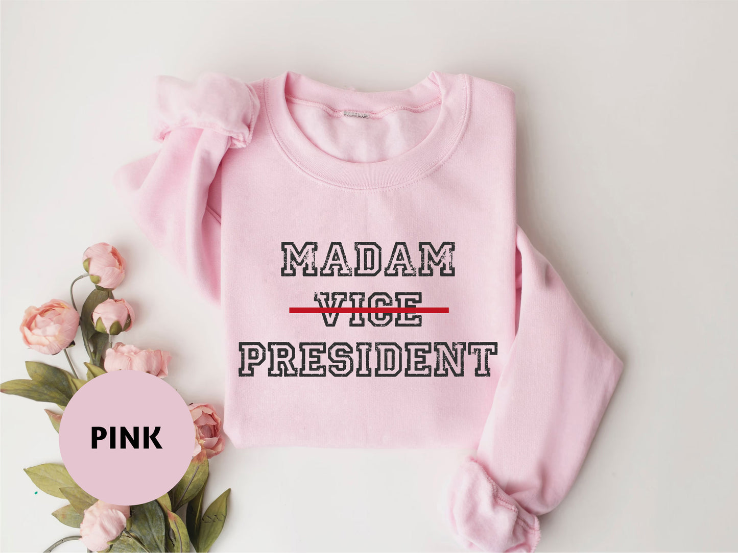 a pink sweater with the words madam, vice, president on it