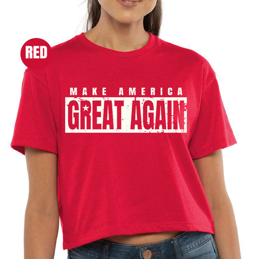 a woman wearing a red shirt that says make america great again