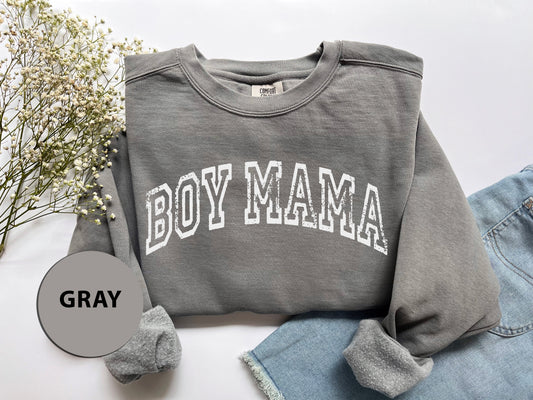 a gray sweatshirt with the word boy mama printed on it