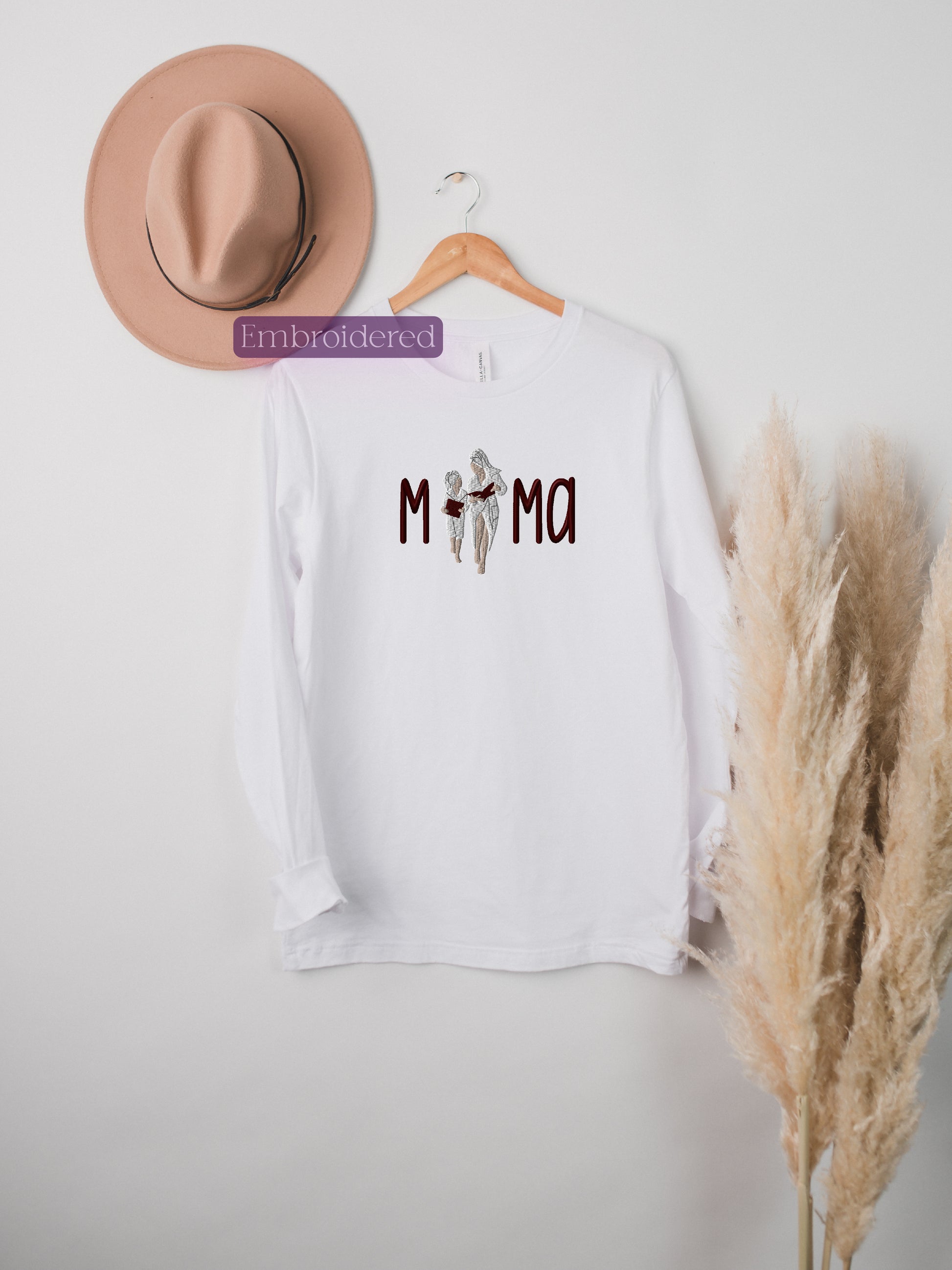 a hat and a t - shirt on a hanger