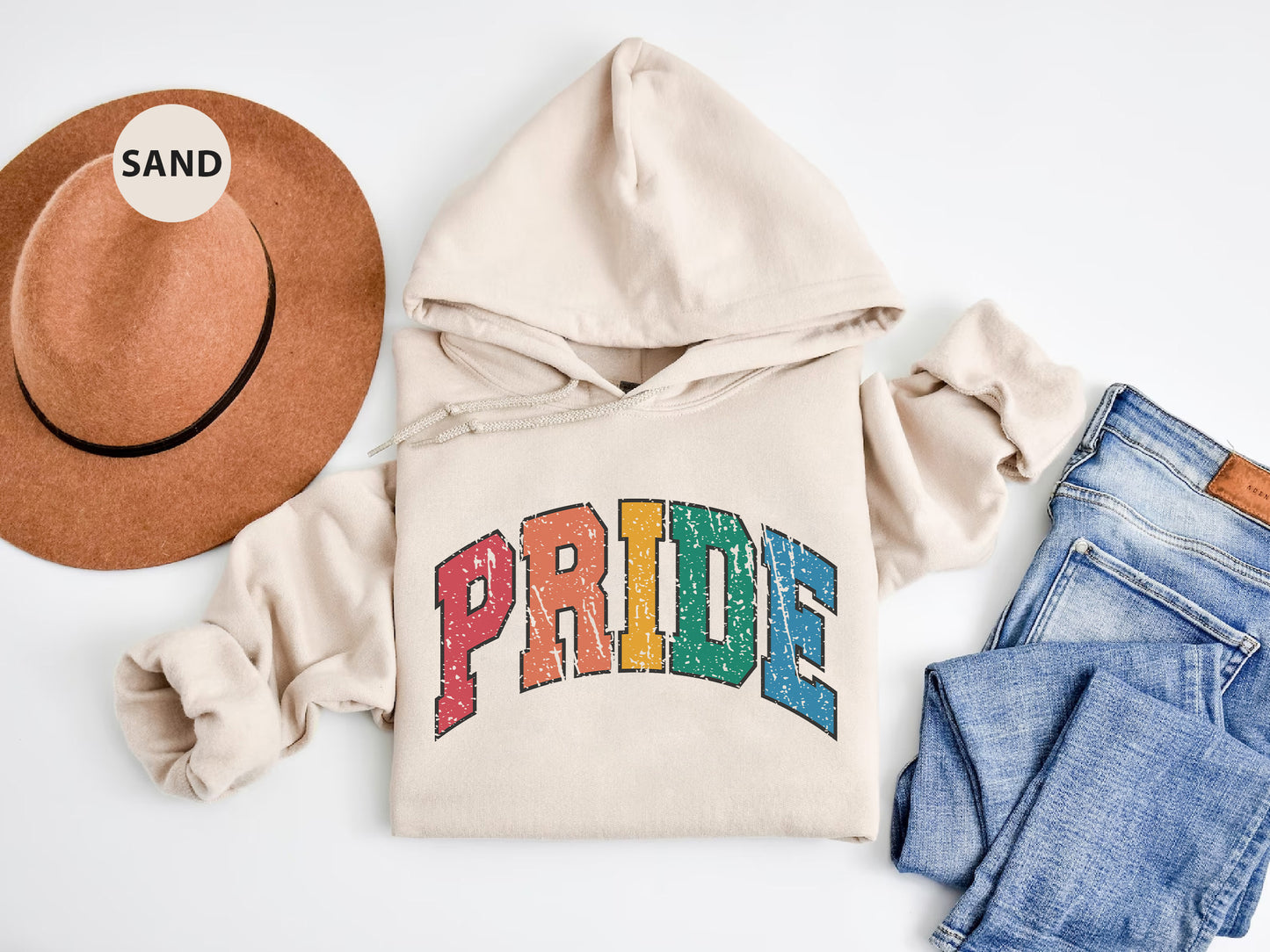 a white hoodie with the word pride printed on it