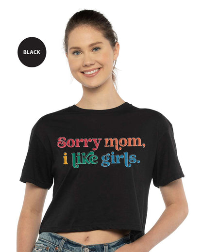 a woman wearing a black shirt that says sorry mom, i like girls