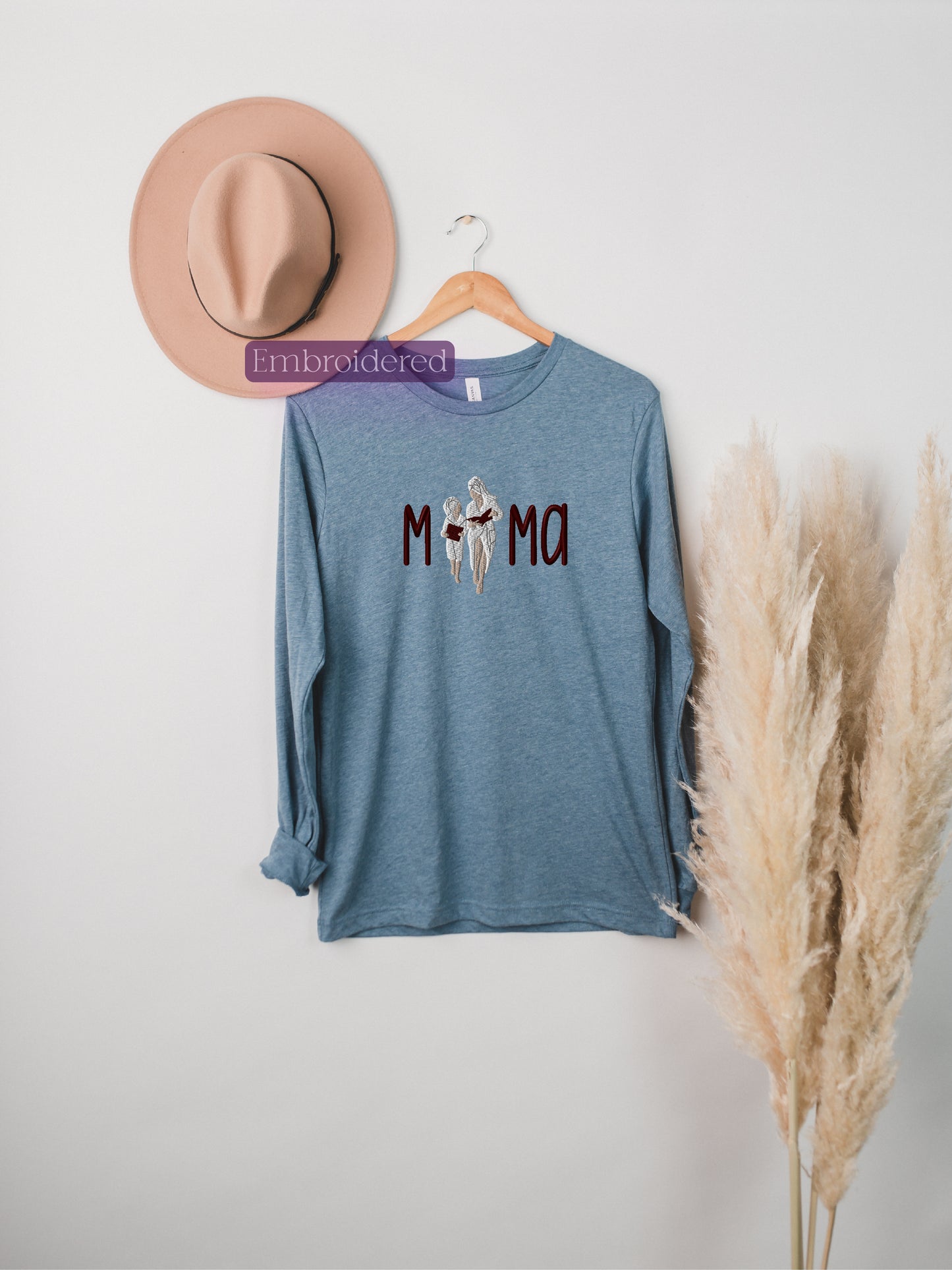 a hat and a t - shirt hanging on a wall