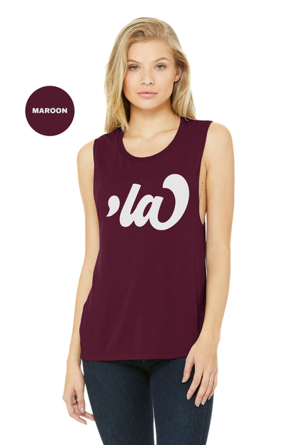 a woman wearing a maroon tank top with the word ca on it