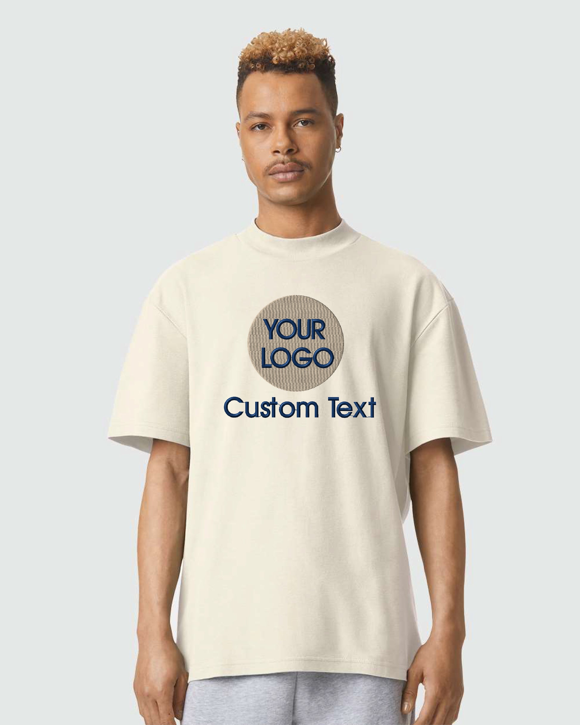 a man wearing a white t - shirt with the words your logo on it