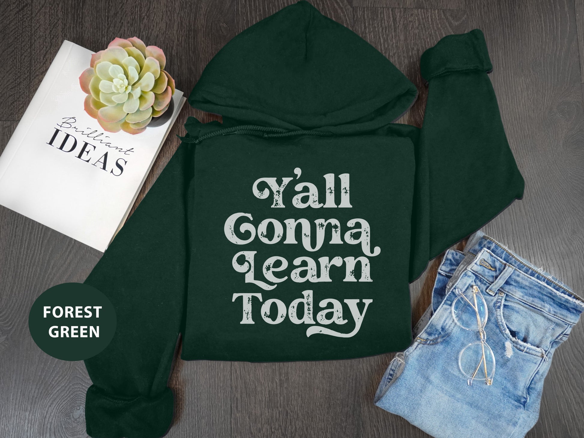 a green hoodie with the words y'all gona learn today on it