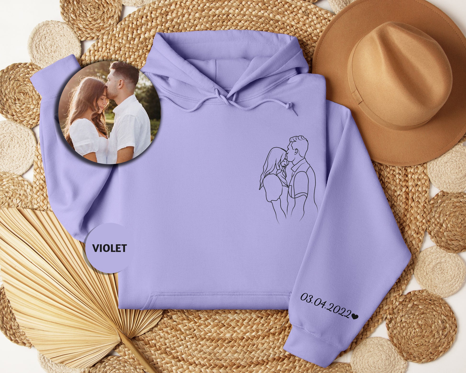 a purple hoodie with a picture of a couple on it