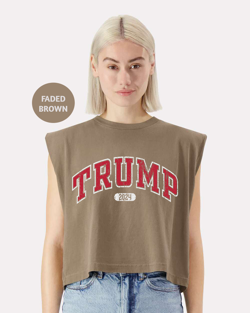 a woman with blonde hair wearing a brown trump crop top