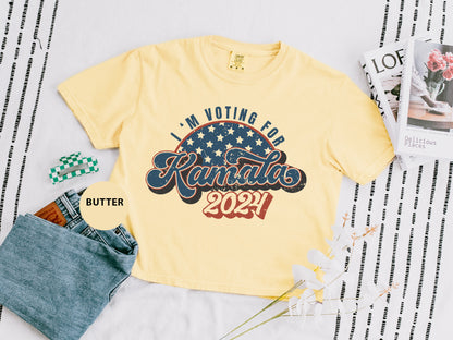 a yellow t - shirt with the words i'm voting for kansas on it