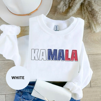 a white shirt with the word kaamala printed on it