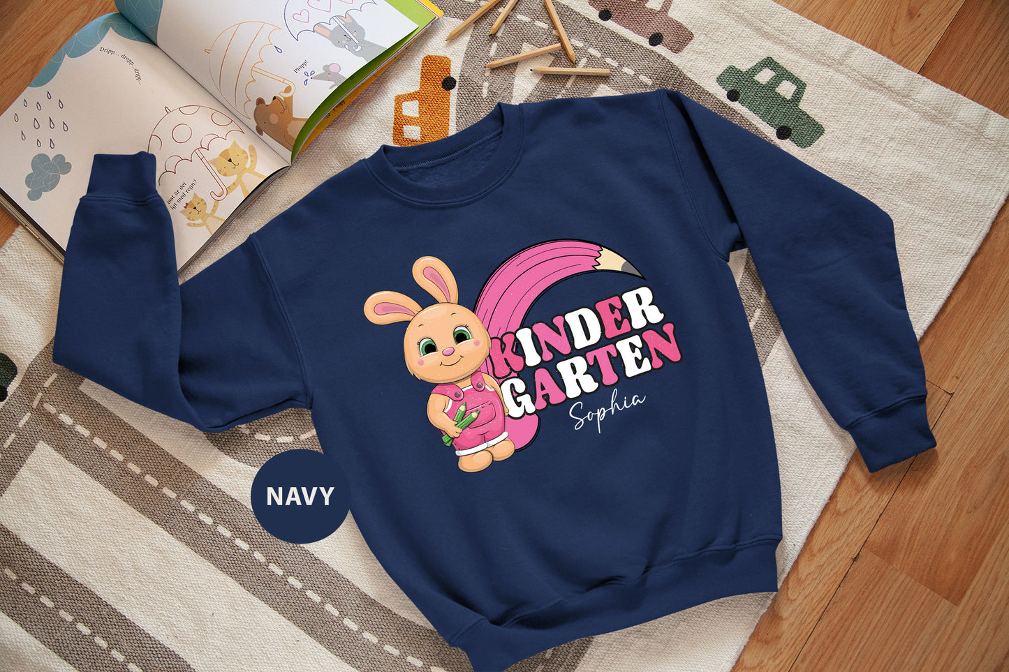 a child's sweatshirt with a cartoon bunny on it