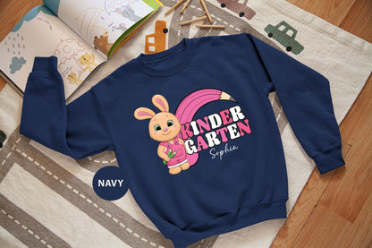 a child's sweatshirt with a cartoon bunny on it