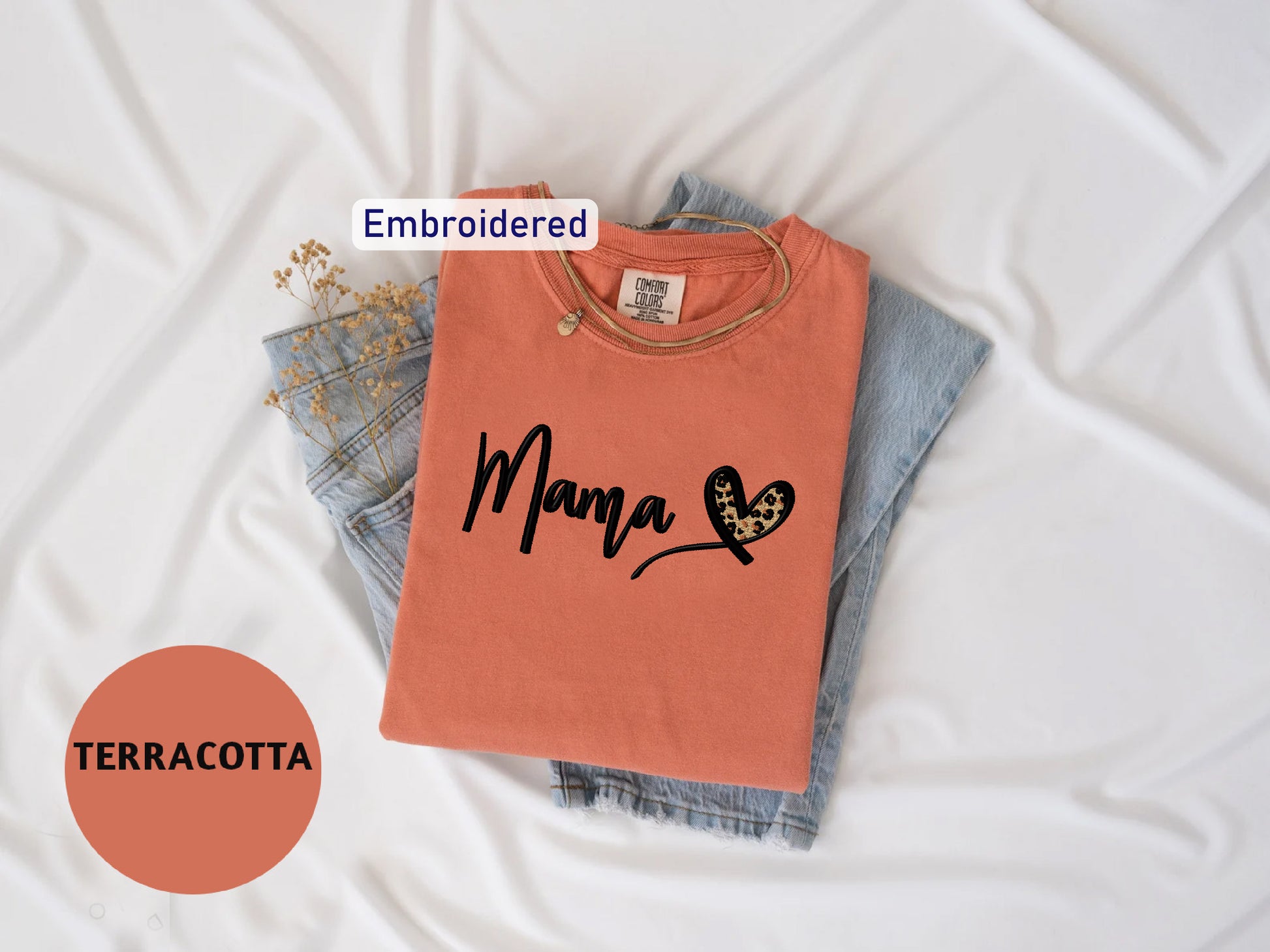 a t - shirt with the word mama written on it