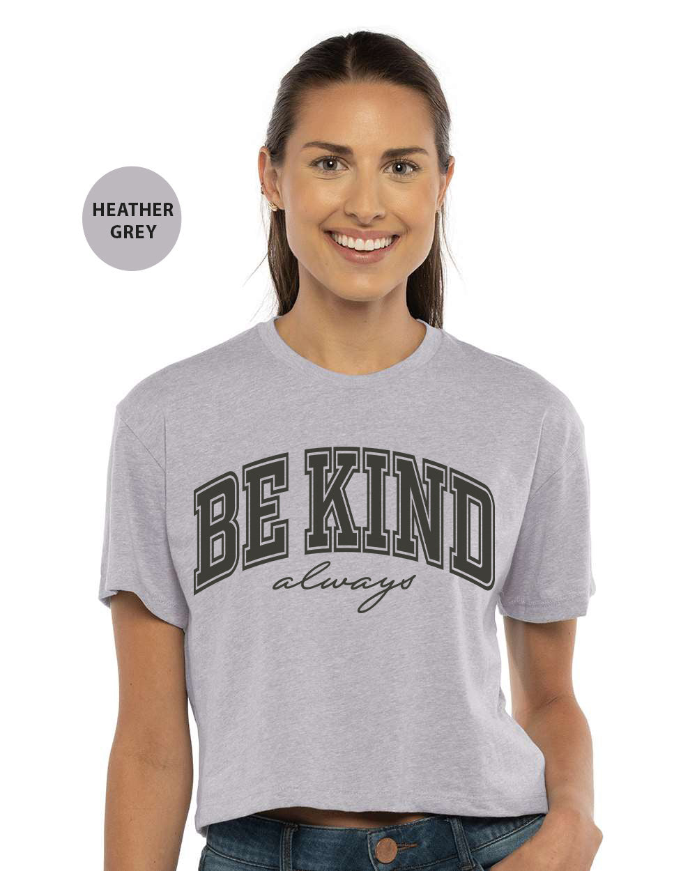 a woman wearing a grey shirt that says be kind of crazy