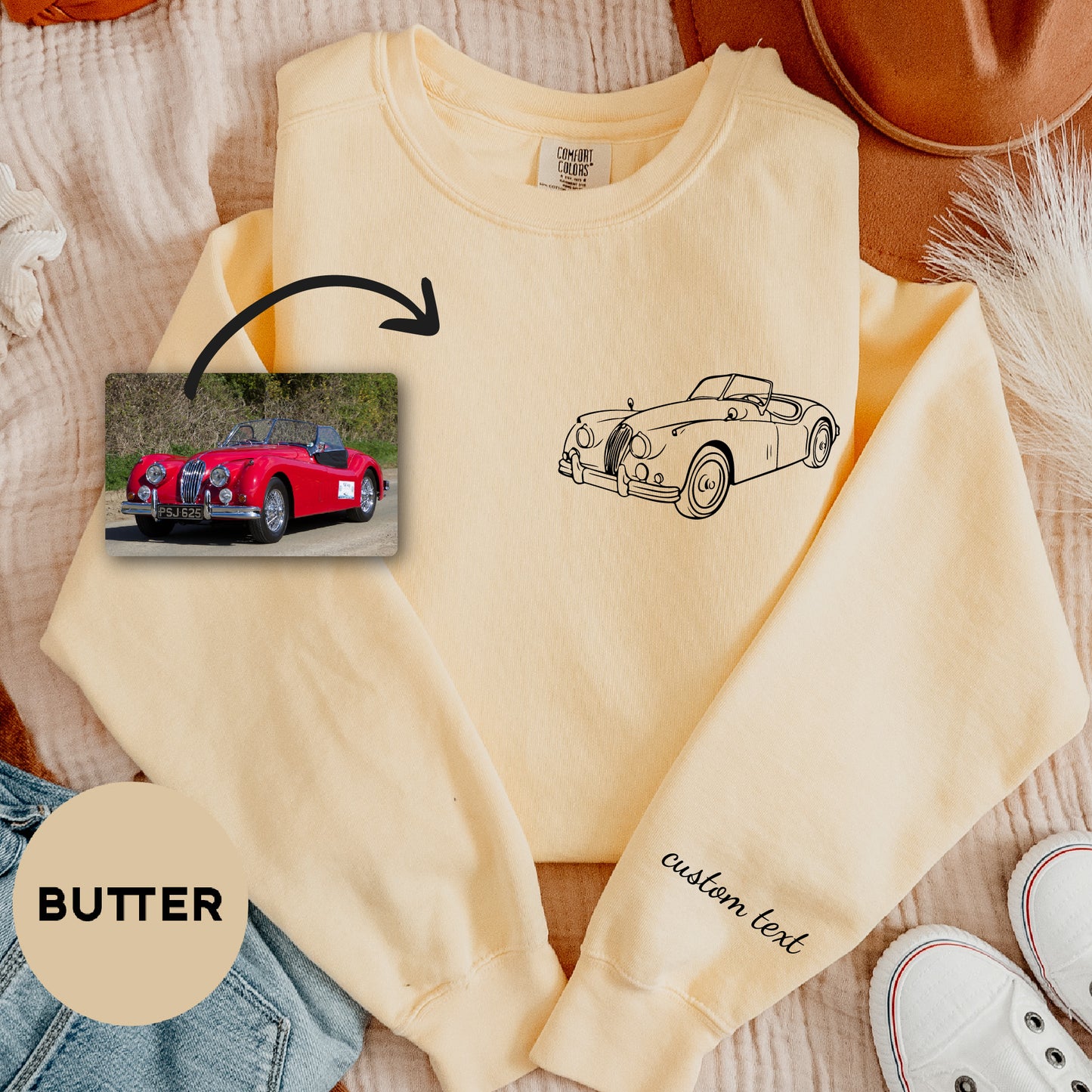 a sweater with a picture of a car on it