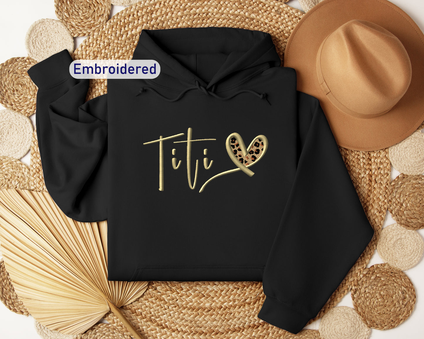 a black hoodie with the word tif on it