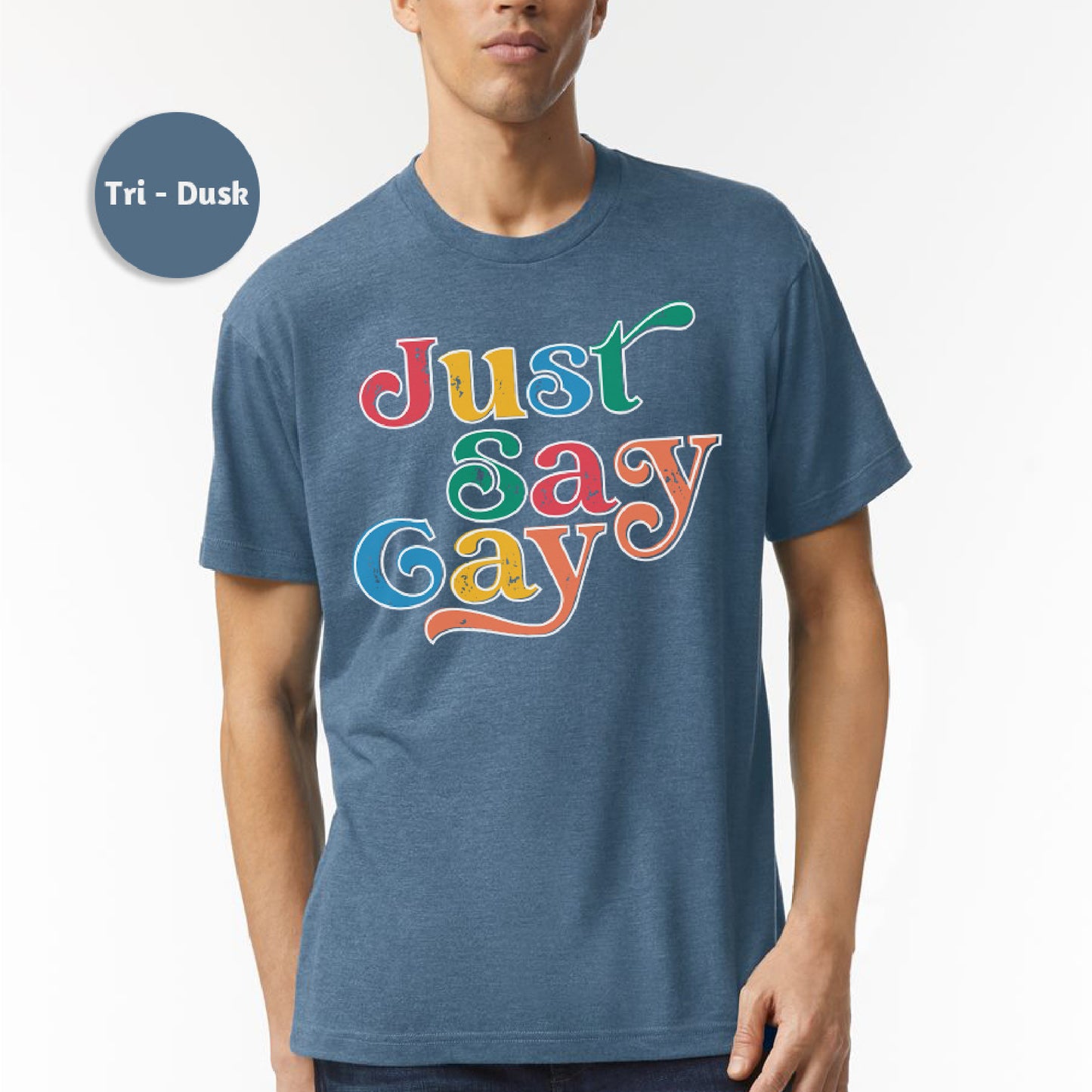 a man wearing a t - shirt that says just gay