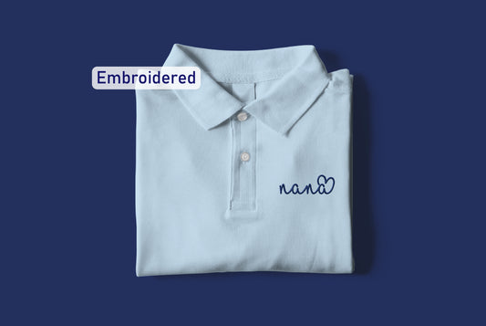 a white polo shirt with a name on it