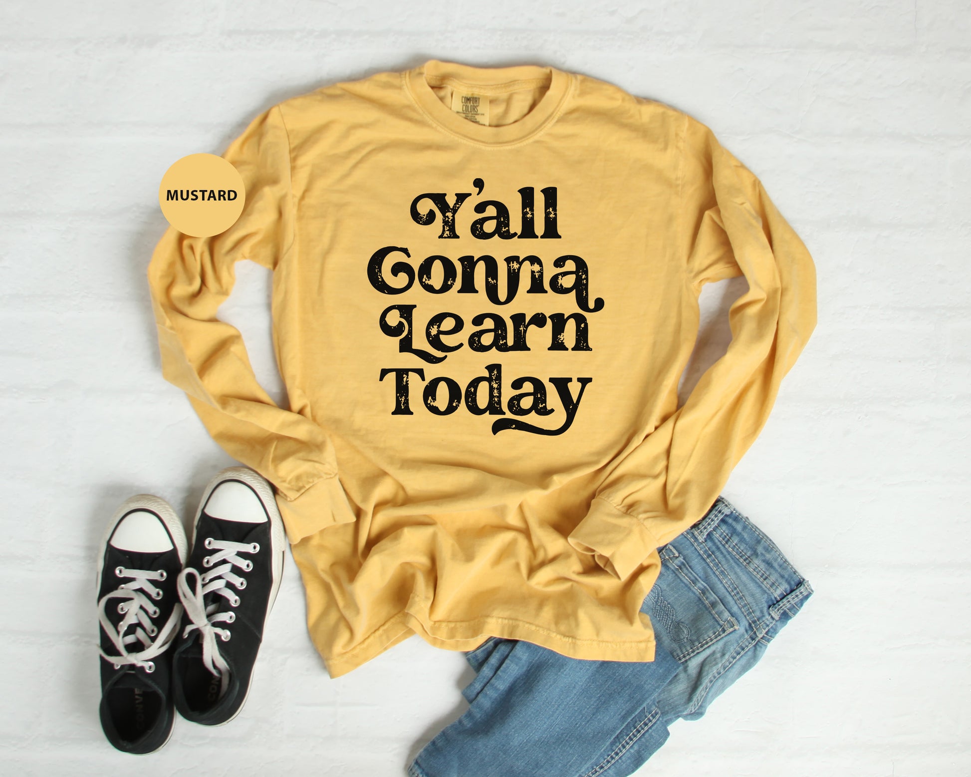 a yellow shirt that says, all gonna learn today