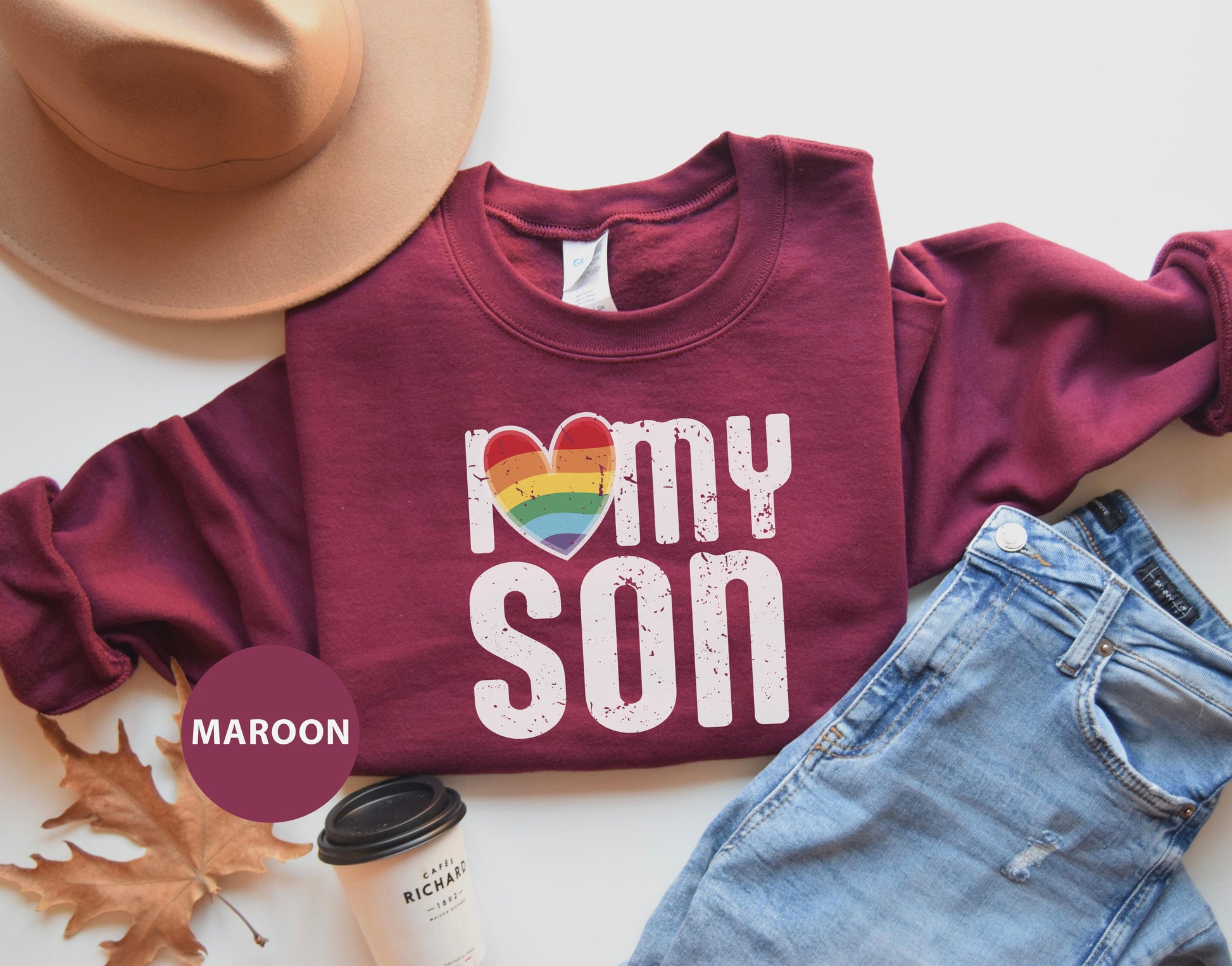 a maroon shirt that says i love my son with a rainbow heart