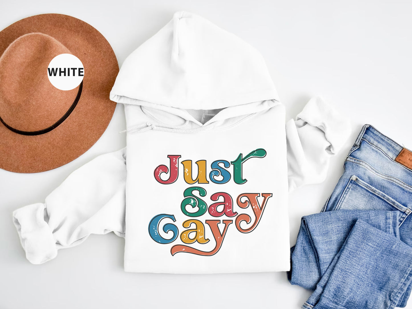 a white hoodie with the words just say gay on it