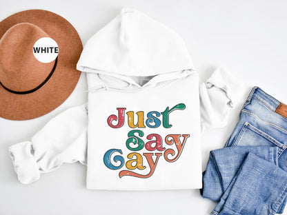 a white hoodie with the words just say gay on it