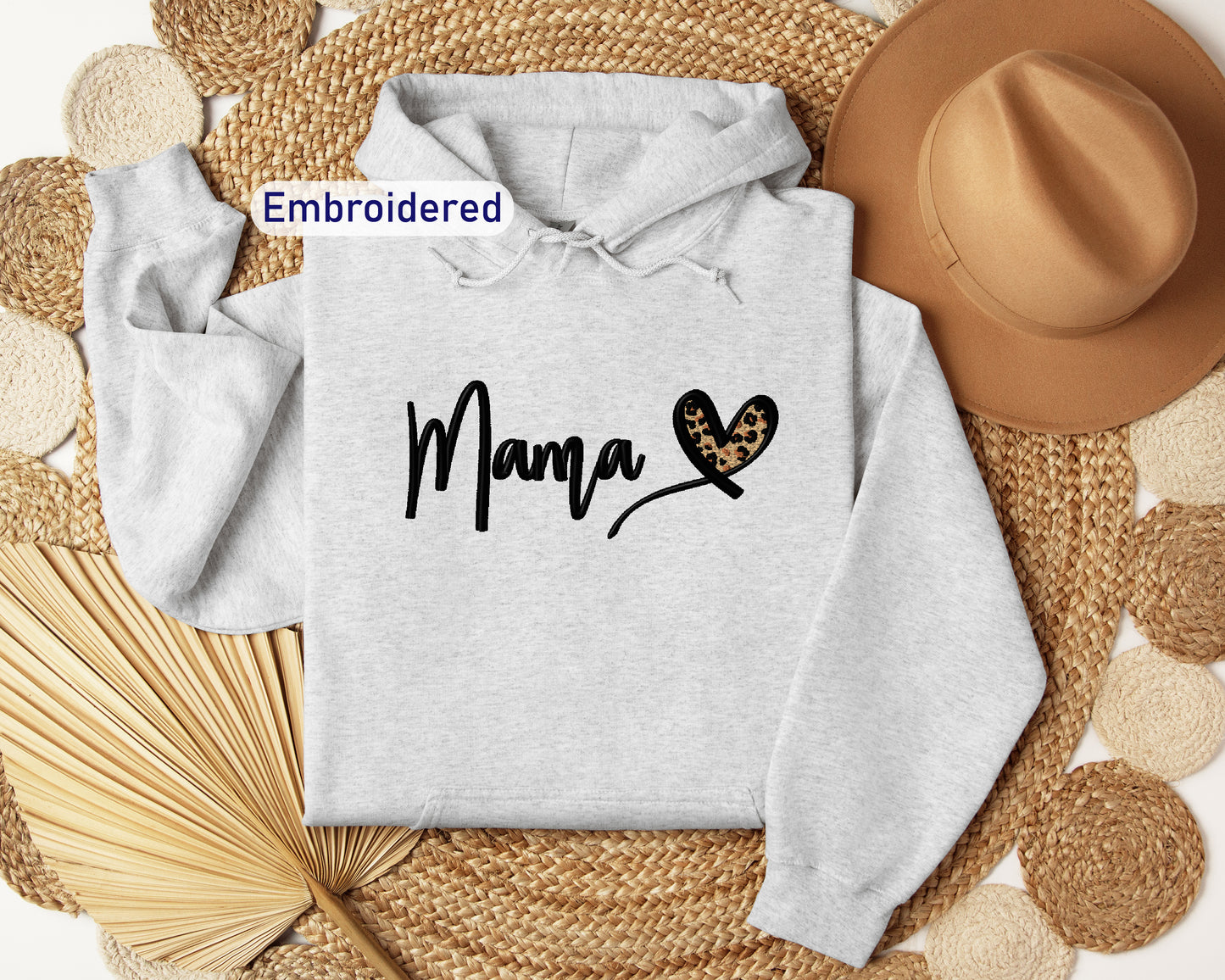 a hoodie with the word mama printed on it