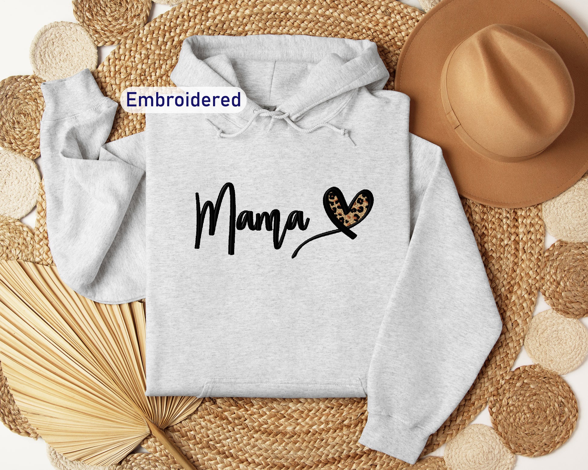 a hoodie with the word mama printed on it