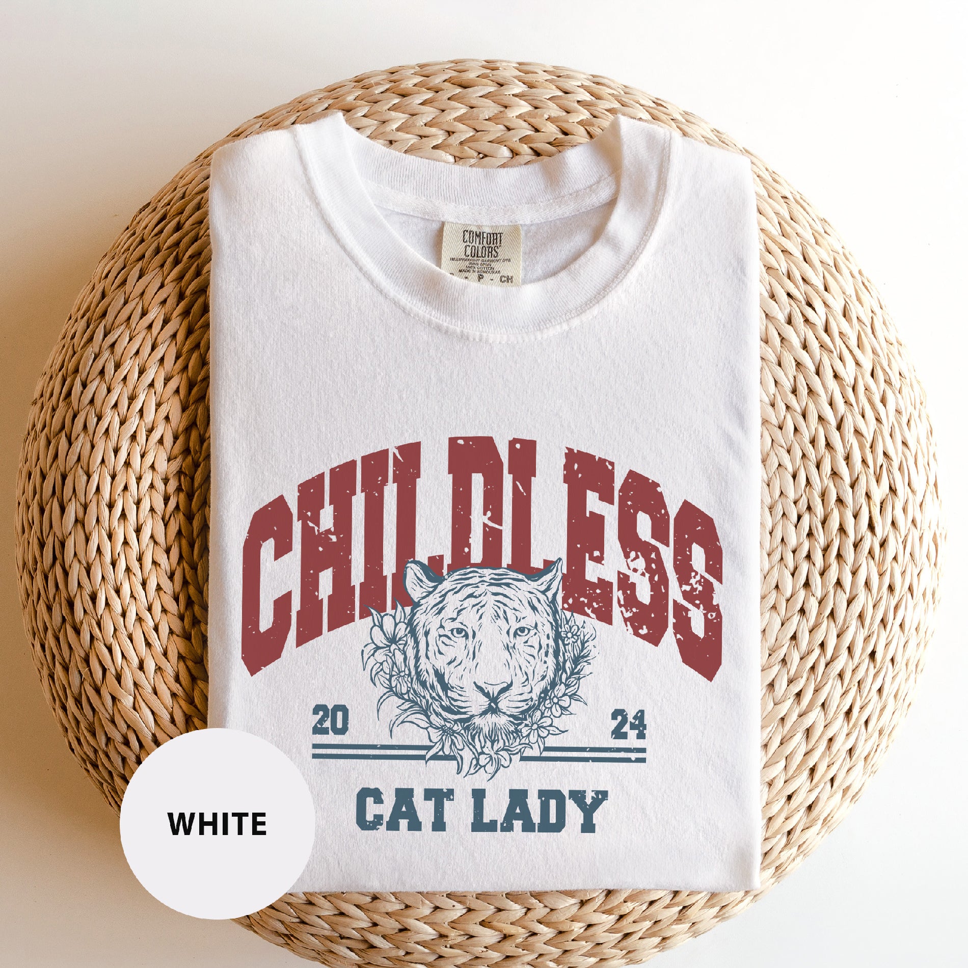 a white t - shirt with a cat lady on it