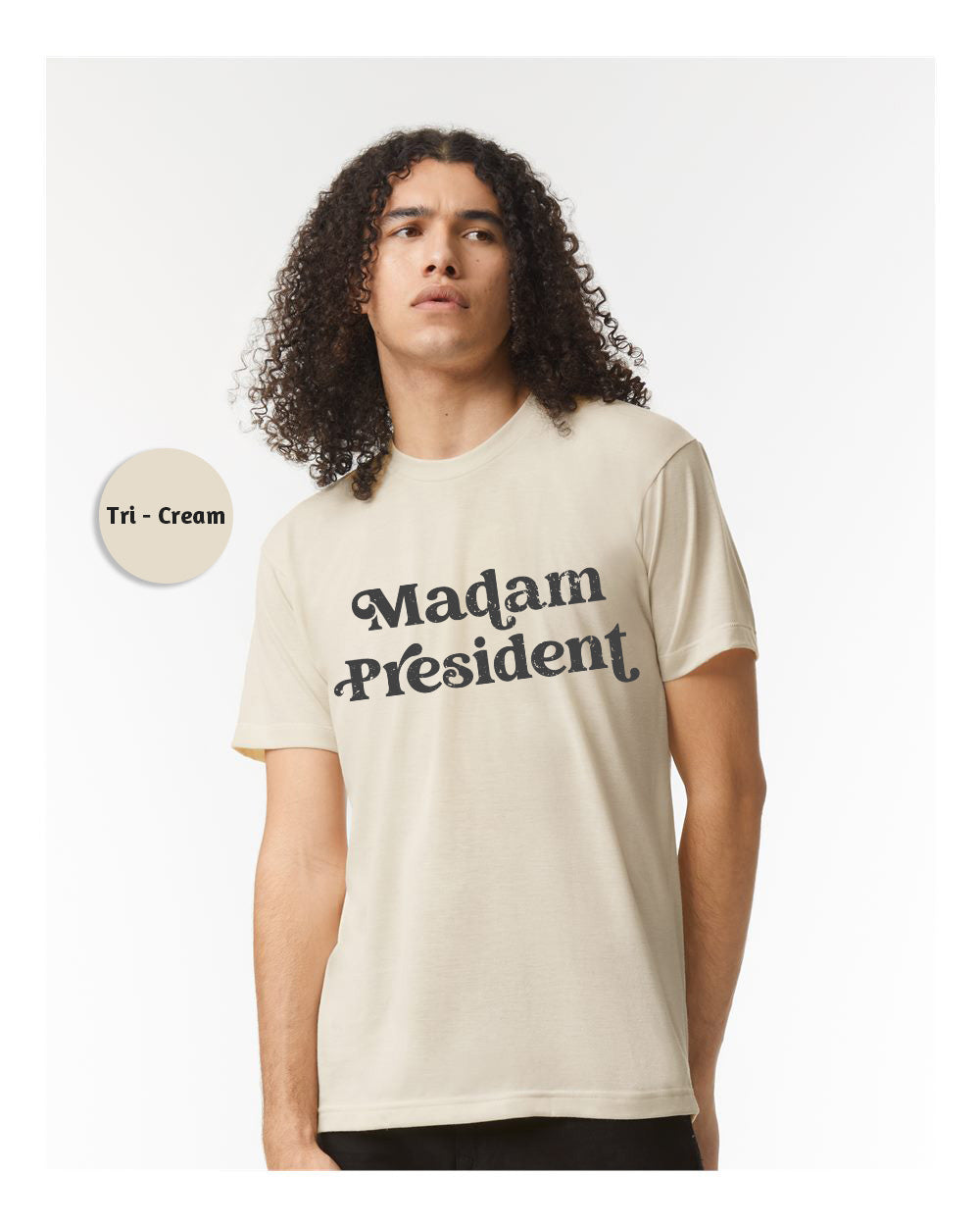 a man wearing a t - shirt that says madam president