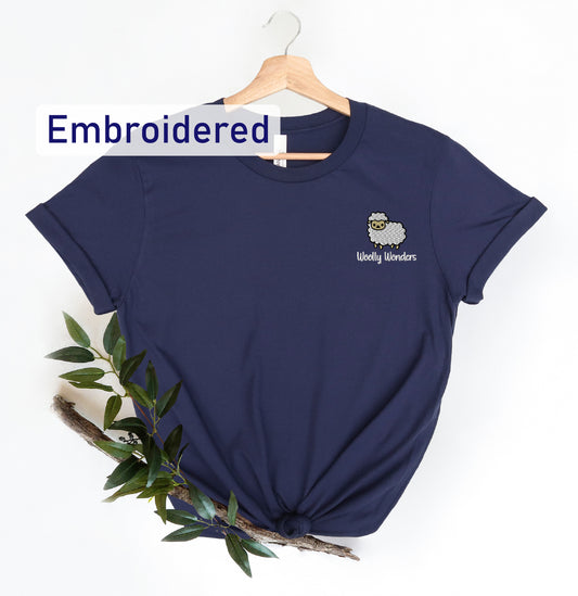 a t - shirt with an embroidered sheep on it