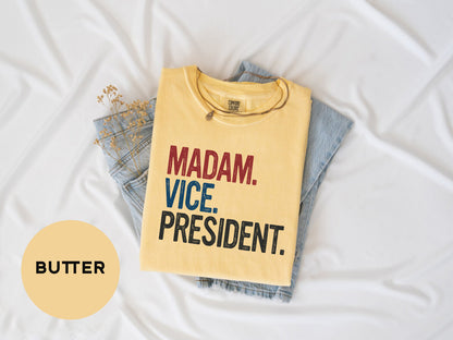 a yellow shirt that says madam vice president