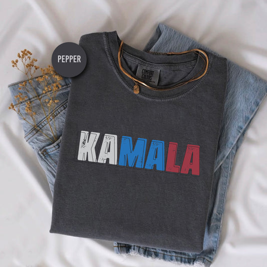 a t - shirt with the word kaamaa printed on it