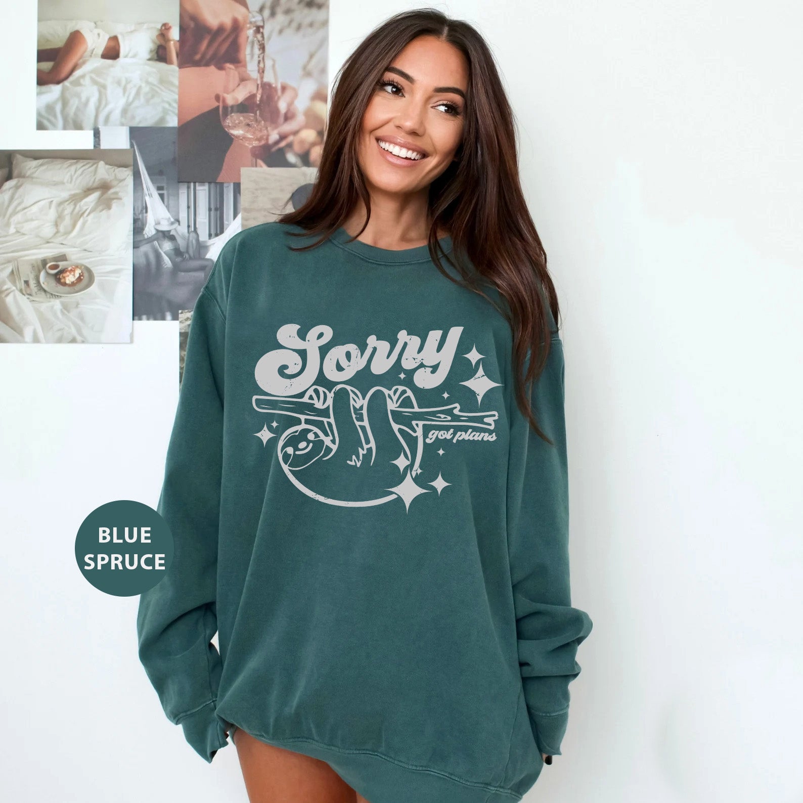 a woman in a green sweatshirt posing for a picture