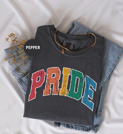 a t - shirt with the word pride printed on it