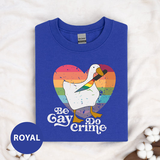 a blue t - shirt with a white goose on it