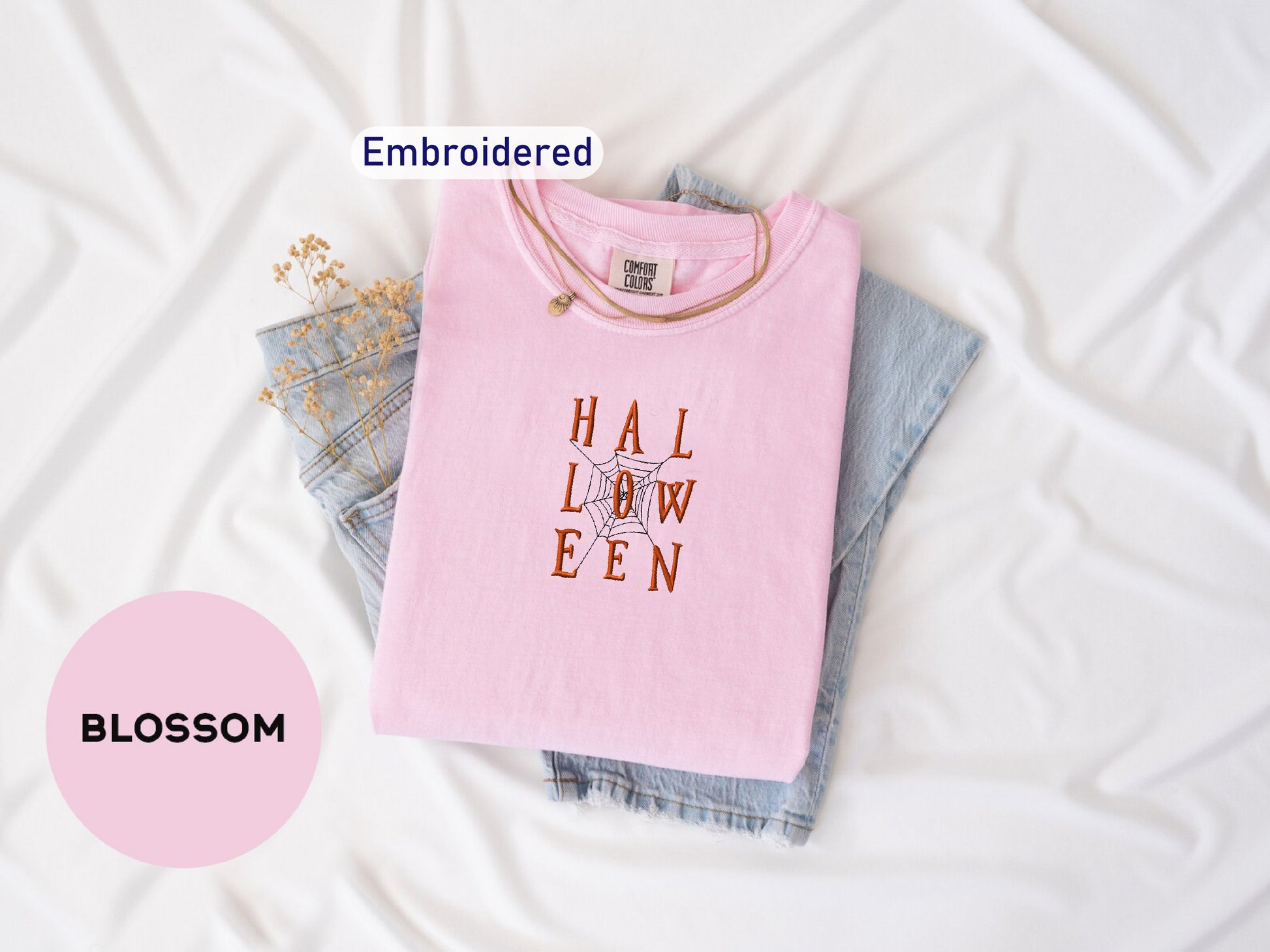 a pink shirt that says hall libw een on it