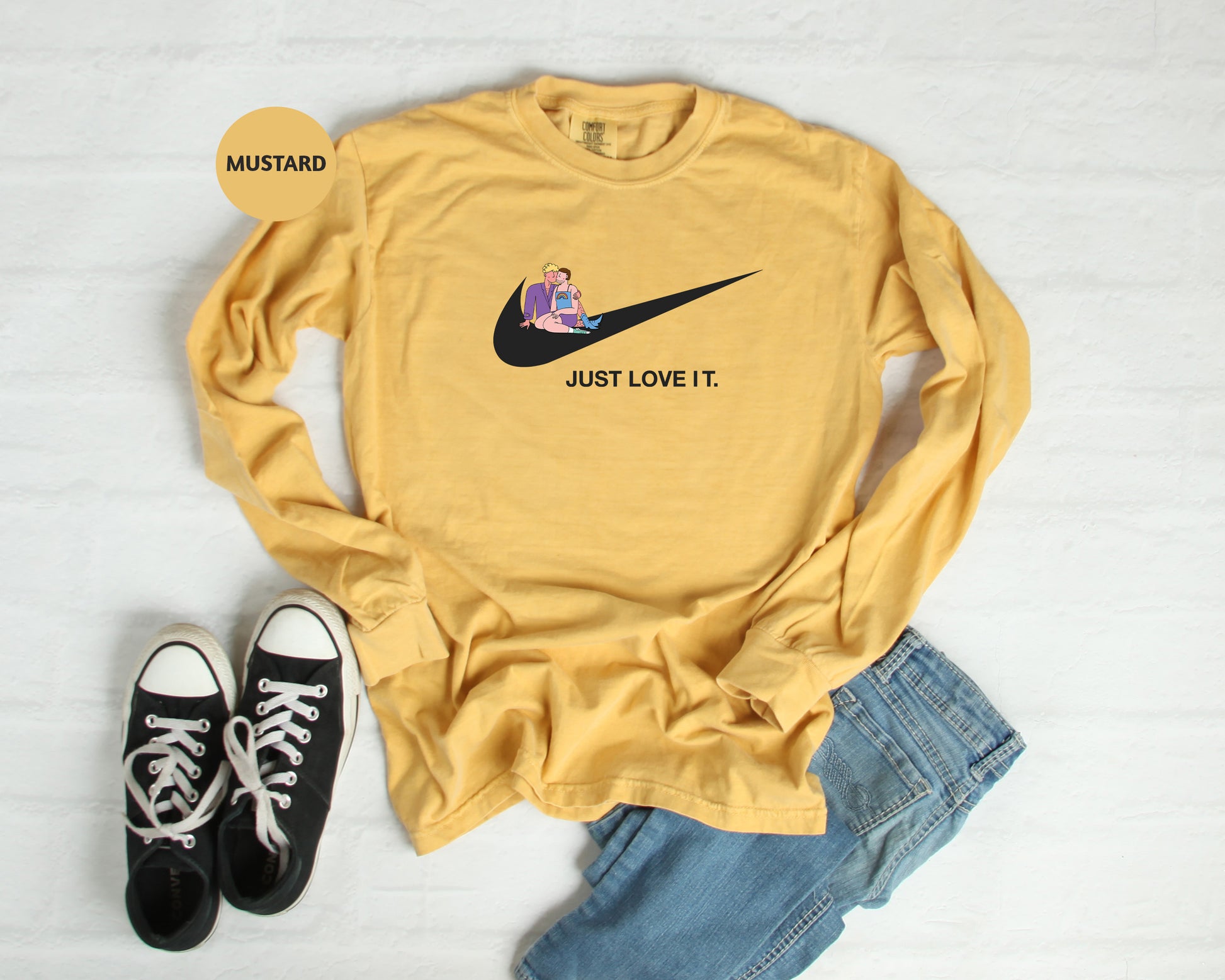 a pair of black converse shoes, a yellow nike shirt, and a pair of