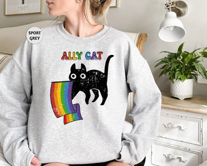 a woman wearing a sweatshirt with a cat on it